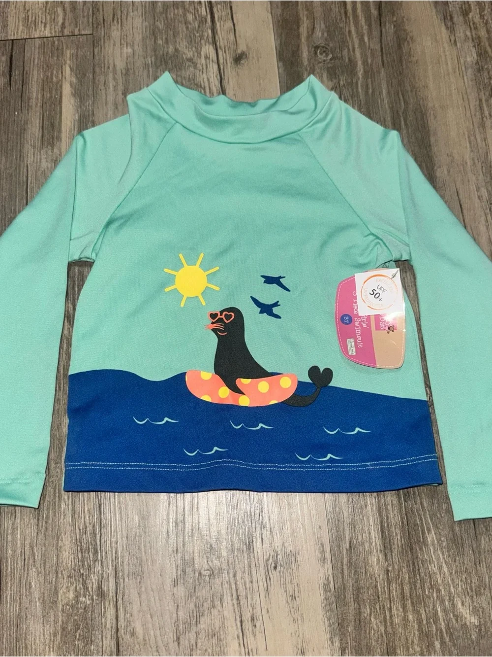 Mint Green Kids Long-Sleeve Rash Guard with Seal Float Graphic